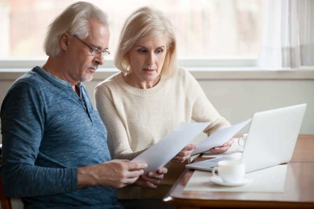 Senior Couple reviewing DIY estate planning
