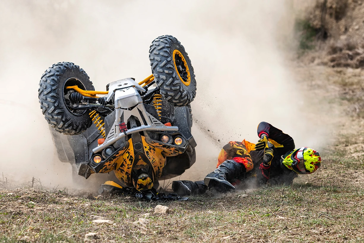 ATV rollover accident in Arizona where rider is thrown from a modified off road vehicle after losing control