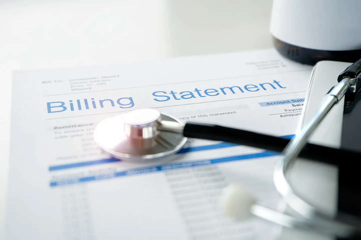 Medical billing statement with stethoscope representing a medical lien after a car accident in Arizona